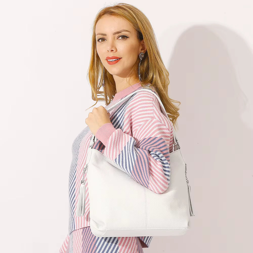 Sac bandoulière double pompon en cuir - Le Jumeau