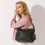 Sac bandoulière double pompon en cuir - Le Jumeau