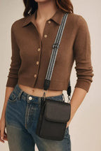 Petit sac bandoulière à anse large en simili cuir