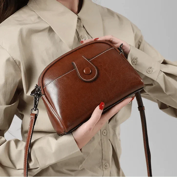 Petit sac bandoulière en cuir vintage