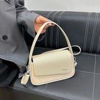 Sac bandoulière à rabat asymétrique