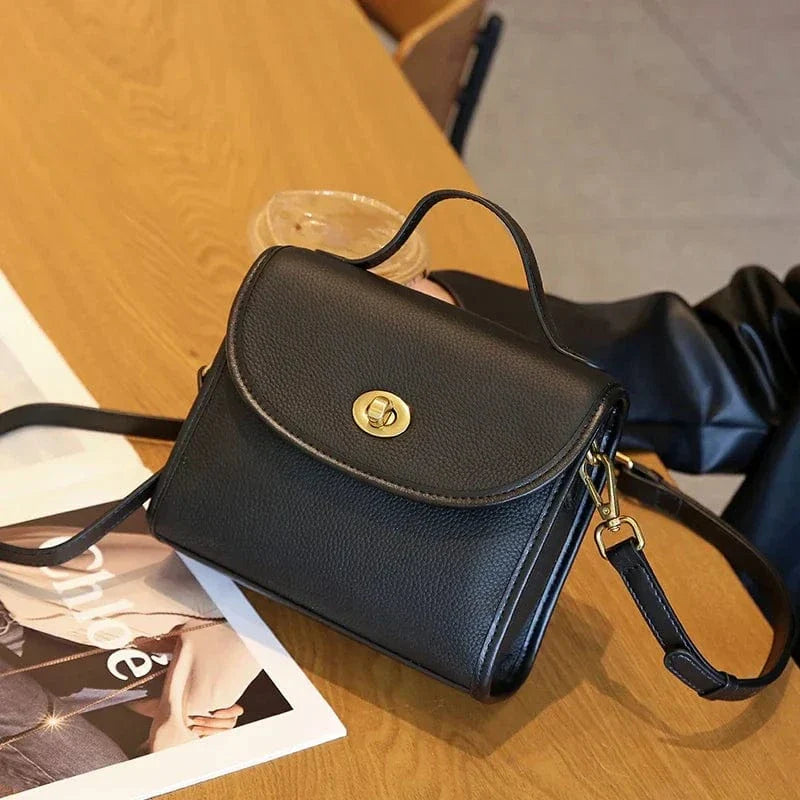 Sac bandoulière à rabat rond en cuir Noir