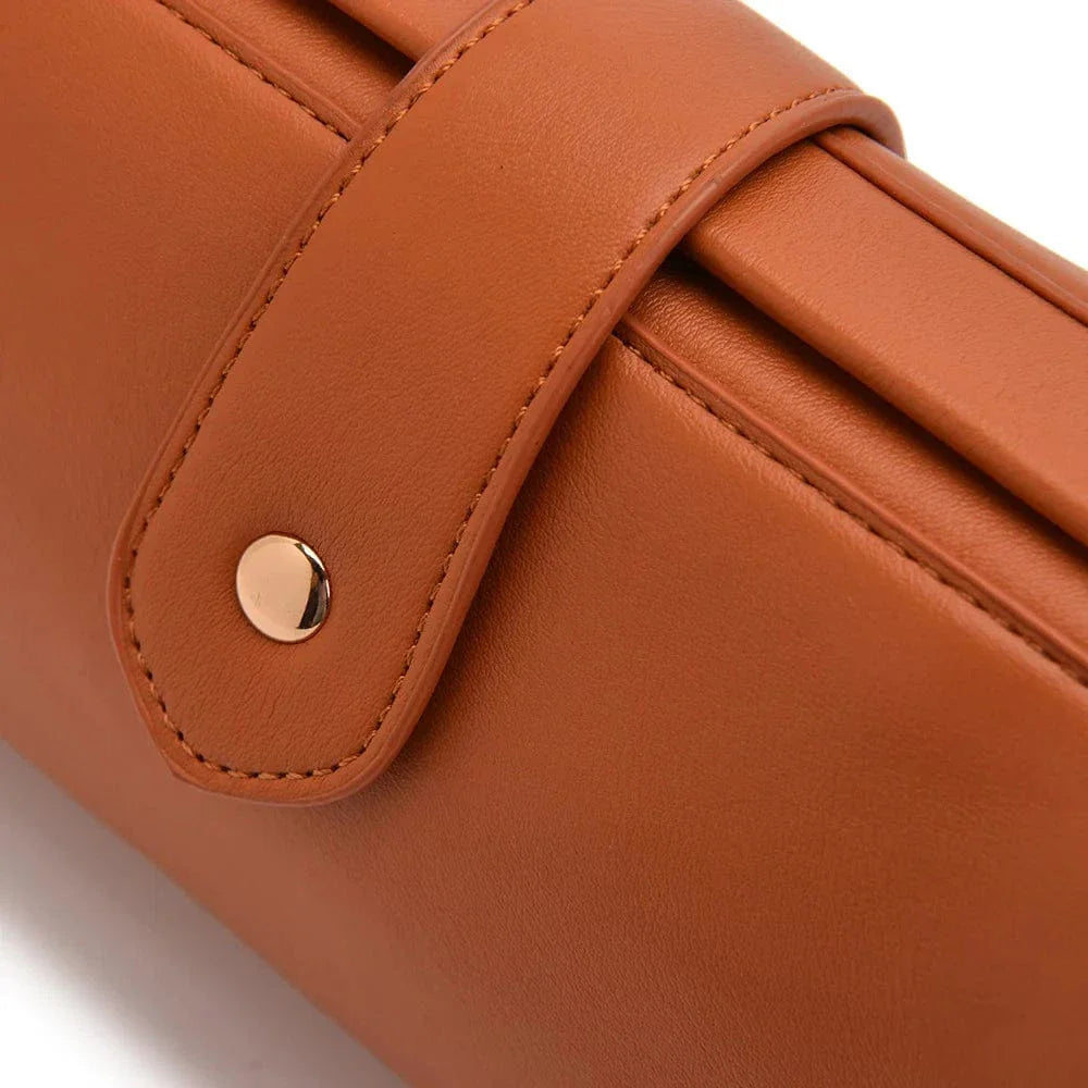 Sac bandoulière baguette a clips en simili cuir