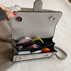 Sac bandoulière brodé à motif floral