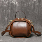 Sac bandoulière coquille en cuir Café