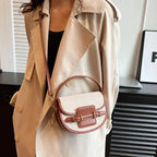 Sac bandoulière demi-lune en toile et cuir