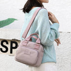 Sac bandoulière en toile multi-poches