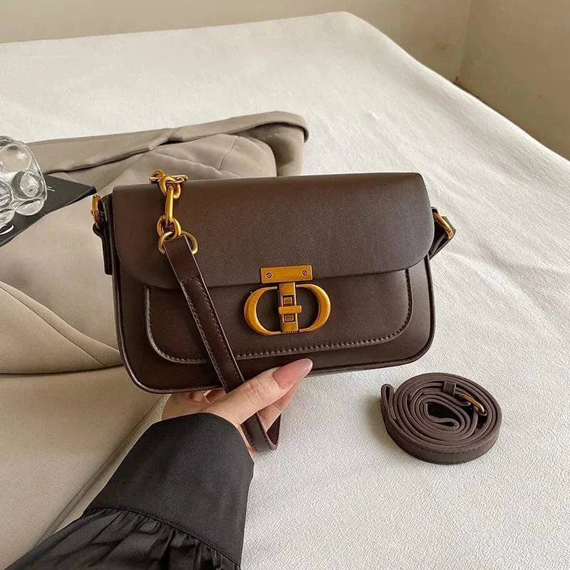 Sac bandoulière noir à fermoir doré Marron