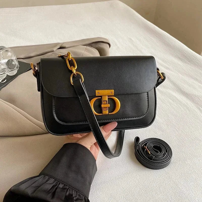 Sac bandoulière noir à fermoir doré Noir