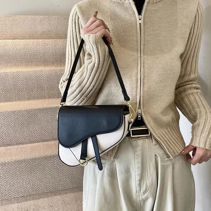 Sac bandoulière selle en cuir bicolore