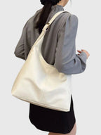 Sac bandoulière élégant et vintage souple - Le Classique